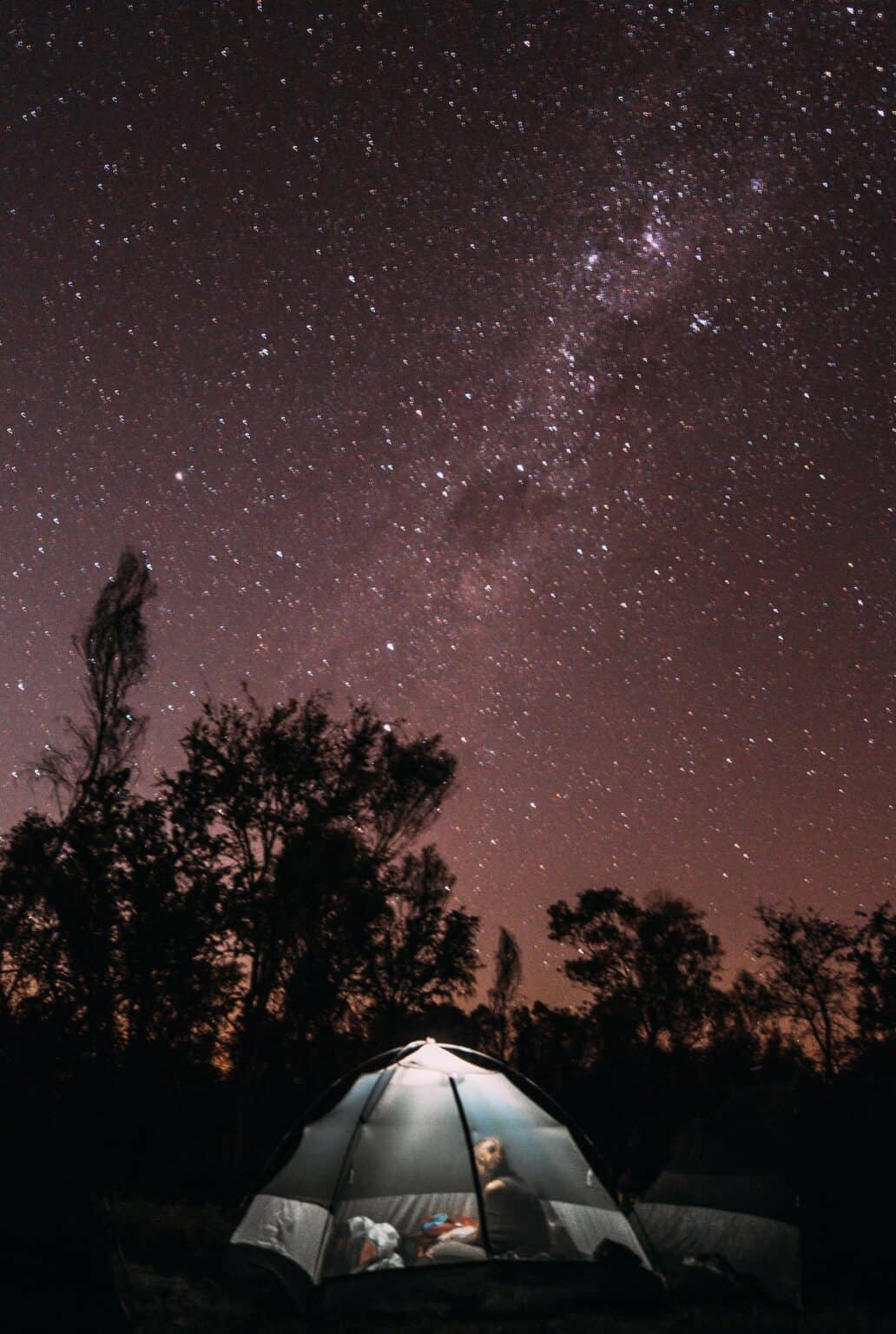 Tent under a night sky