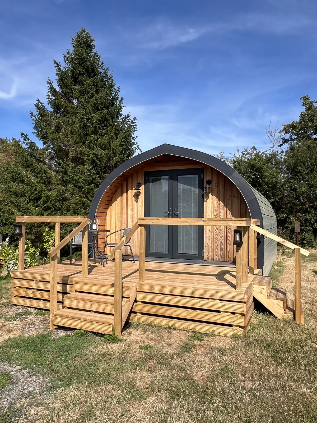 Emily Pod from the front, with timber decking and steps