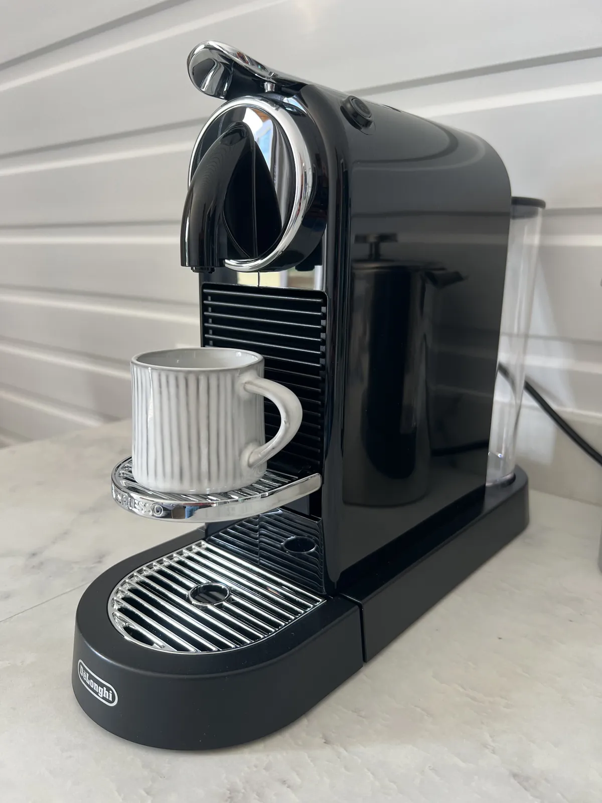 Nespresso coffee machine with a mug